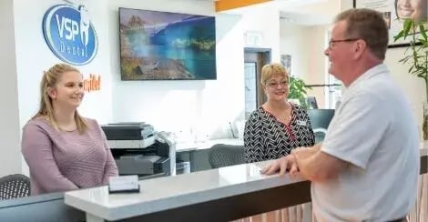 dental-patient-speaking-to-dental-receptionists