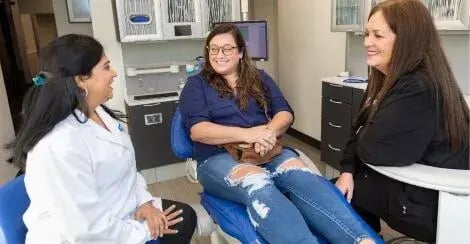 dental-patient-speaking-with-dentist