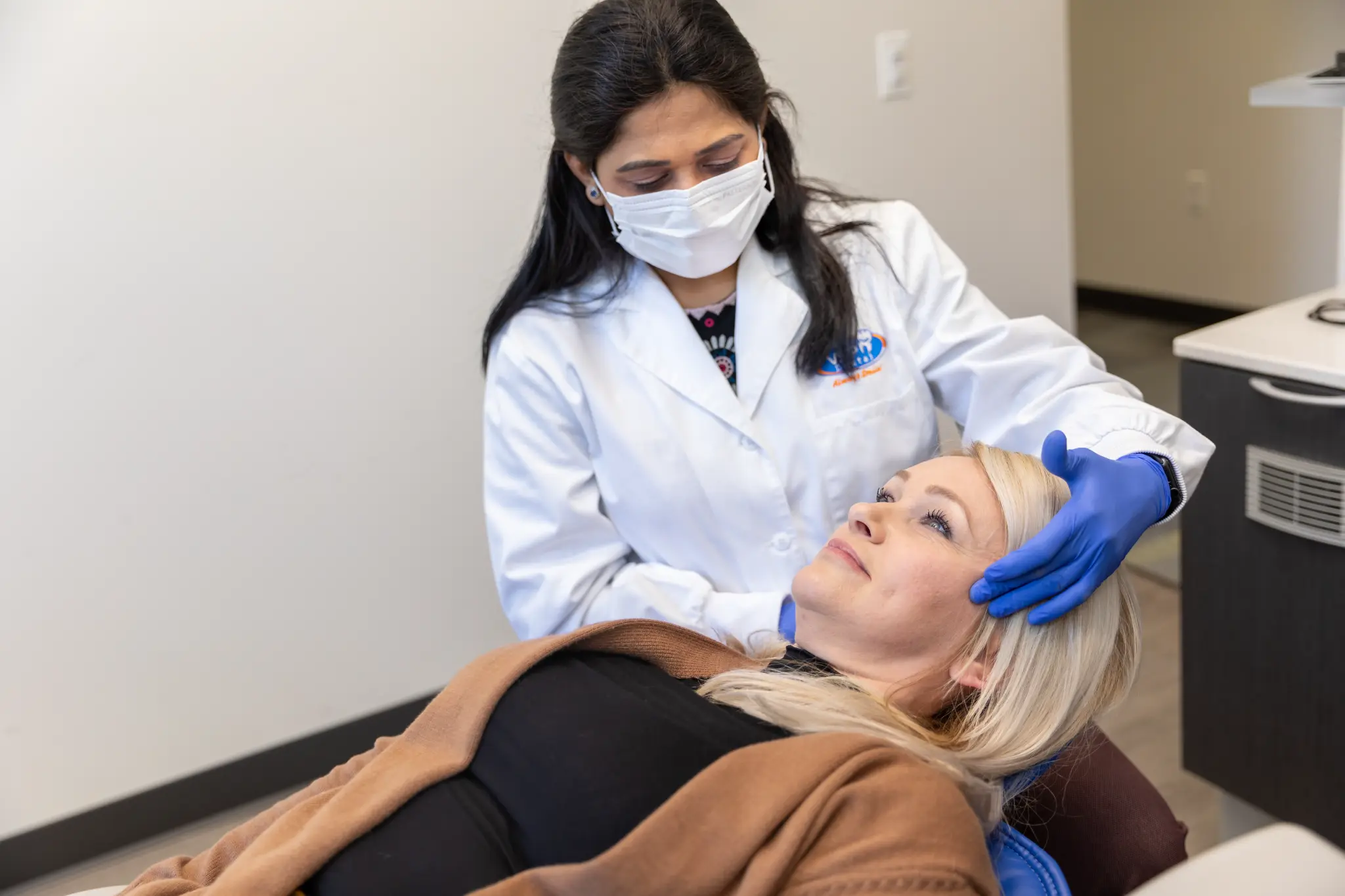VSP Dental doctor providing attentive care to a patient during treatment
